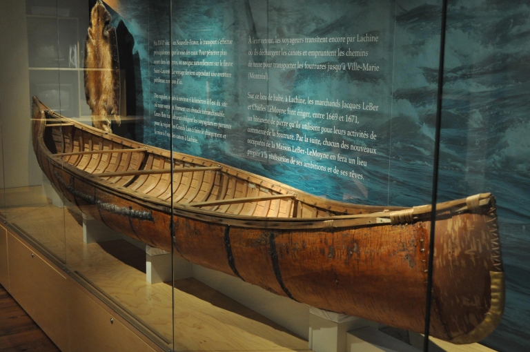  Birch bark canoe. About 1950. Wood; birch bark; root; resin; nails. First Nation, Algonquian, Malecite. Length: 4.2 meters.Restored by Aaron York. 
