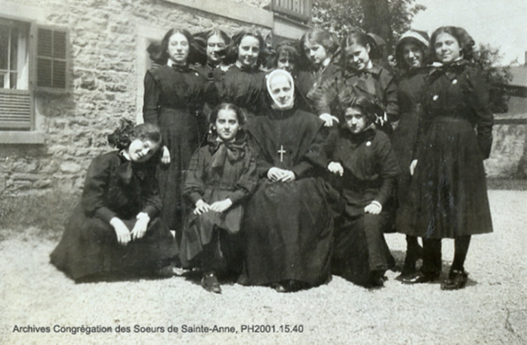 Sister of the Congregation of Saint Anne with boarders, about 1912  