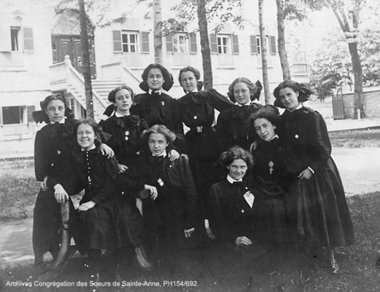 Students in front of Sisters of Saint Anne boarding school, Lachine, about 1909.